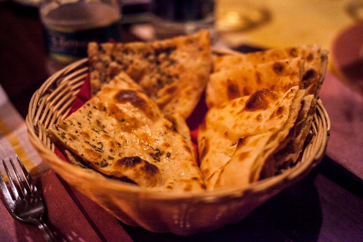 Basket of warm naan bread